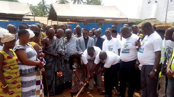 Minister for Tourism, Culture and Creative Arts, Mrs. Catherine Afeku cutting the sod