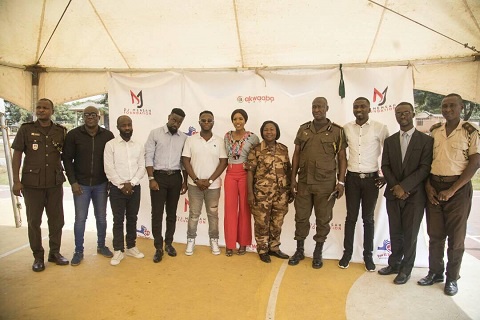 Dj Mensah in a group picture with other celebrities who were present