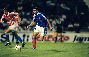 Zidane (R) made his France debut in August 1994