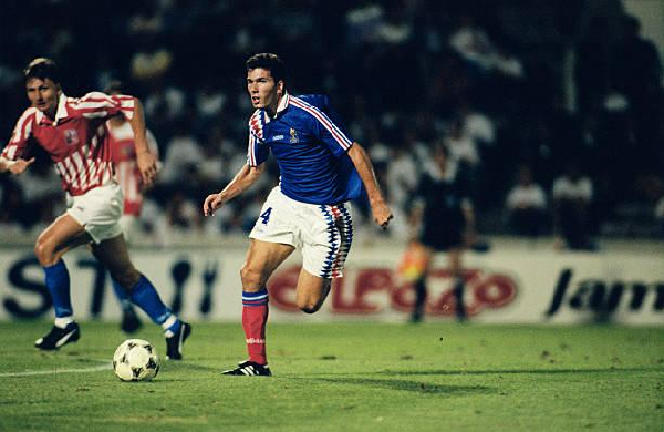 Zidane (R) made his France debut in August 1994