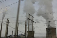 Fumes from a manufacturing company fill the air