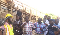 Roads and Highway minister, Kwasi Amoako Atta (3rd Left) with Salifu Saeed at Yapei