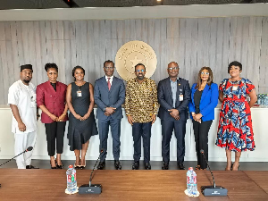 Dr. Baidoo (3rd from right) in a group picture with the Governor, Dr. Asiama and management memebrs