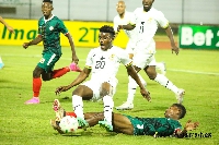 Kudus Mohammed tackled by Malagasy player