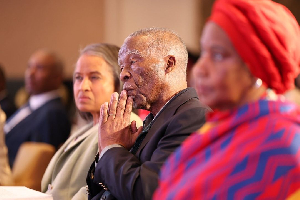 Former South African President Thabo Mbeki [C] and some personalities at the event