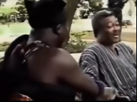 A picture of Otumfuo and Former President JJ Rawlings shaking hands