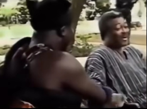 A picture of Otumfuo and Former President JJ Rawlings shaking hands