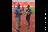Osman Bukari (right) having a chit-chat with Appiah Stadium