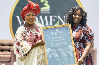 Whitney Boakye-Mensah [R] receiving her citation