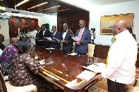 President Nana Akufo-Addo swearing in the 10-member GIPC Board