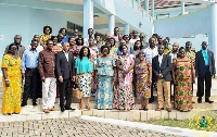 The Minister in a group photograph with the participants