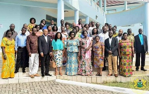 The Minister in a group photograph with the participants
