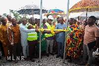 George Mireku Duker cutting the ribbon for official opening of the project