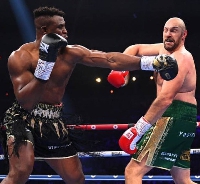 Francis Ngannou landing a punch on Tyson Fury