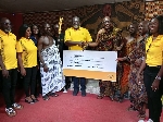 Staff of MTN presenting a cheque to the chiefs of Kwahu.