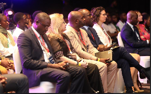 Some participants seated at the conference