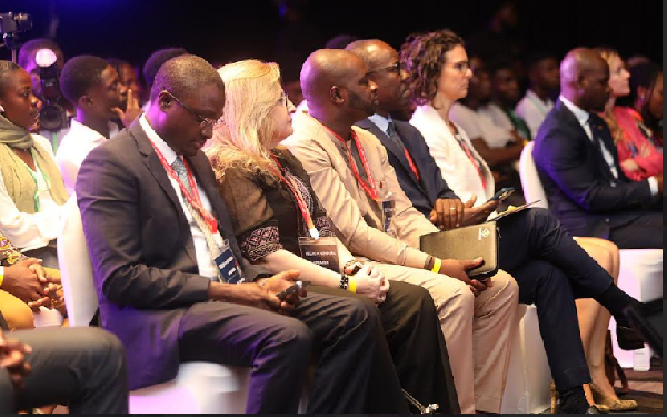 Some participants seated at the conference