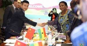 First Lady Mrs. Rebecca Akufo-Addo shaking hands with Chinese investors
