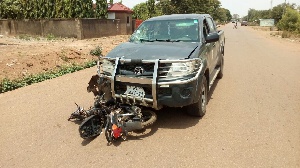 Toyota Hilux double cabin pick up numbered GV 444-11 and  the motorbike of the victim