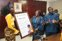 Hamamat being presented a citation by the Minister of Tourism Dzifa Gomashie