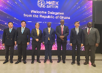 Ghana's Lands and Natural Resources Minister with some investors in Hong Kong