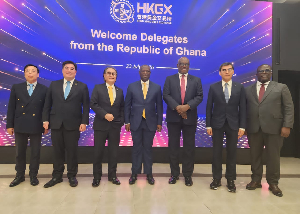 Ghana's Lands and Natural Resources Minister with some investors in Hong Kong