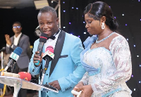 Reverend Isaac Nii Adjei Smith with his wife during his inauguration