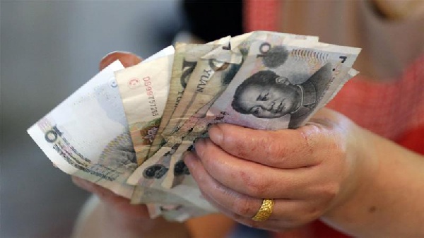 Chinese Yuan in hand
