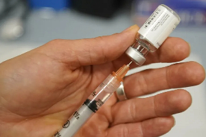 Sterile water is prepared for a one-dose bottle of the measles, mumps and rubella vaccine