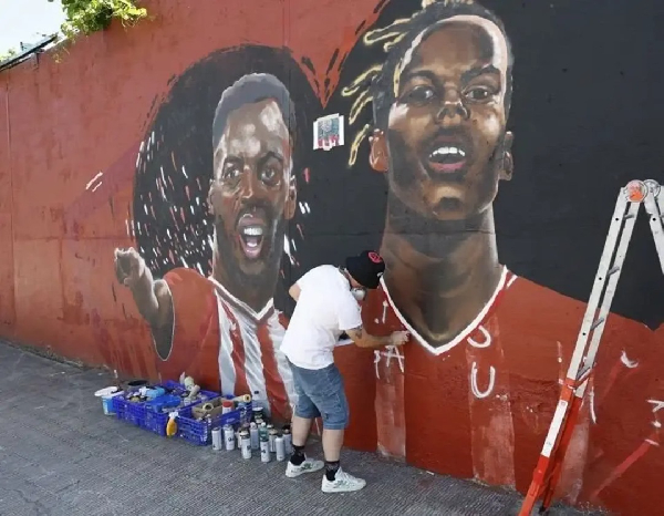 A mural of Inaki (L) and his brother Nico (R)