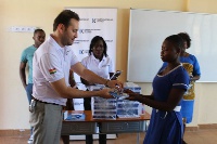 Karpower Ghana team presenting books to  Manhean Anglican Cluster of Schools