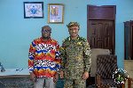 Comptroller-General of Immigration Basintale Amadu (R) with Dormaa MCE Dominic Adomah Ameyam
