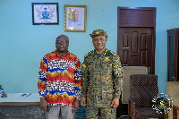 Comptroller-General of Immigration Basintale Amadu (R) with Dormaa MCE Dominic Adomah Ameyam