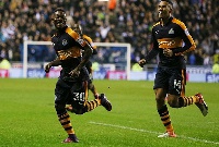 Atsu is followed by team mates to celebrate his goal against Wigan yesterday