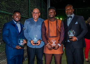 Asamoah Gyan with Hope Performance Tennis leaders and others