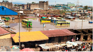 Buses stuck in floodwater at Kware area of Pipeline estate in Nairobi, Kenya on May 1, 2024.