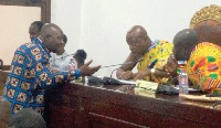 Togbe Afede XIV with others exchanging pleasantries