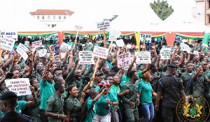 The youth gathered behind the Lands Commission's office at Adum