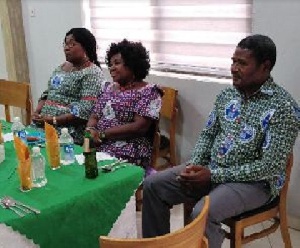 Margaret Nsiah-Asamoah flanked by two of her deputies, Christina Taylor (L), Gabriel Kotei (R)