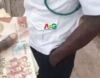 Screenshot of alleged bribe captured on camera.