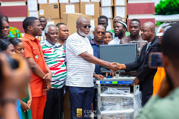 Dr James Avedzi and Edem Agbana are pictured here during the presentation