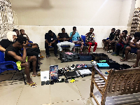 Display of suspects who were arrested in the cybercrime syndicate operation