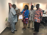 MP for Ablekuma West, Ursula Owusu-Erkuful being presented with a citation