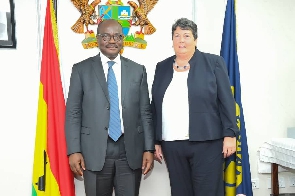 Ernest Addison with Virginia Palmer during her visit to his office