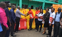 GOIL Zonal Manager presenting the equipment to an official of the Assembly
