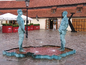 Statues Of Two Men Who Urinate