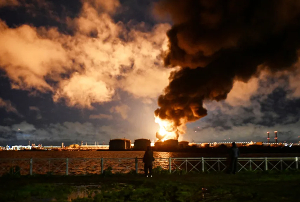 Smoke rises above the city following an air attack on the oil terminal in Saint Petersburg, Russia Smoke rises above the city following an air attack on the oil terminal in Saint Petersburg, Russia
