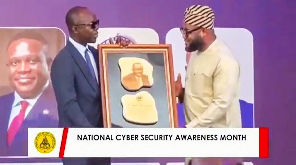 Former D-G of CSA Dr Antwi-Boasiako (L) & Deputy Minister of Communication, Mohammed Adams