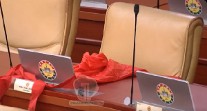 The seat of Ernest Kumi draped in red cloth