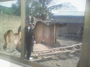 Police at the site of the demolition